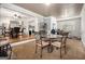 Dining area featuring a table with four chairs, with views into the living room and kitchen at 4352 Treeline Way, Douglasville, GA 30135