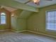 Bedroom featuring vaulted ceilings, neutral carpeting, light green walls, and large windows for natural light at 834 Chalet Hills, Mcdonough, GA 30253
