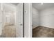 A roomy walk-in closet with metal shelving is conveniently located off of the main bedroom at 10422 Trellis Lane (Lot 38), Hampton, GA 30228