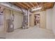 Unfinished basement space with exposed utilities and potential for future customization and expansion at 351 Weldon Rd, Palmetto, GA 30268