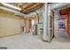 Unfinished basement space with visible ductwork and water heater, ready for customization at 351 Weldon Rd, Palmetto, GA 30268