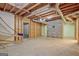 Unfinished basement with exposed ductwork, concrete walls, and ample space for storage or future development at 351 Weldon Rd, Palmetto, GA 30268