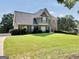 Beautiful two-story home boasting a spacious green lawn and classic design elements at 106 Big Cotton Trl, Mcdonough, GA 30252