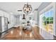 Gourmet eat-in kitchen with stainless steel appliances and white cabinets at 106 Big Cotton Trl, Mcdonough, GA 30252