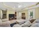 Inviting living room has comfortable furniture, a neutral color scheme, and convenient access to the kitchen at 106 Big Cotton Trl, Mcdonough, GA 30252
