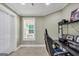 Bright home office features natural light and functional workspace with a modern desk and comfortable chair at 106 Big Cotton Trl, Mcdonough, GA 30252