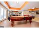 Finished basement featuring a billiard table, stair case, and neutral colors at 1074 Glenloch Rd, Roopville, GA 30170