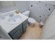 Bathroom featuring a white porcelain sink, neutral paint, and a toilet at 1074 Glenloch Rd, Roopville, GA 30170