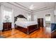 Spacious main bedroom with trey ceiling, hardwood floors, and abundant natural light at 1074 Glenloch Rd, Roopville, GA 30170