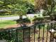 View of the front yard from the porch, showing a well maintained lawn and mature trees at 3746 Gladney Dr, Atlanta, GA 30341