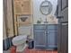 Charming half-bathroom featuring unique storage and design elements at 504 Ridgelake Dr, Peachtree City, GA 30269