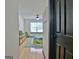 Bedroom view from doorway showing a ceiling fan and large window at 504 Ridgelake Dr, Peachtree City, GA 30269