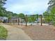 Fenced in community pool featuring landscaping, trees, and walkways at 504 Ridgelake Dr, Peachtree City, GA 30269