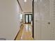 Hallway with wood floors and white walls at 504 Ridgelake Dr, Peachtree City, GA 30269