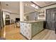 The open-concept kitchen flows into the living area, offering a seamless living space at 504 Ridgelake Dr, Peachtree City, GA 30269