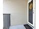 Condo front door with a wreath, mat, and white trim at 504 Ridgelake Dr, Peachtree City, GA 30269