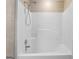 Clean bathroom showcasing a shower and tub combination with tile surround at 1120 Rawlings Dr, Rutledge, GA 30663