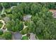 Overhead shot of the home, highlighting its mature landscaping and the privacy of the wooded lot at 140 Silvermere, Fayetteville, GA 30215