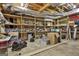 Unfinished basement area with exposed ceiling, shelving, and concrete floor, offering ample storage and potential at 140 Silvermere, Fayetteville, GA 30215