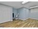 Finished basement area features vinyl floors, a double closet and a window providing natural light and ventilation at 140 Silvermere, Fayetteville, GA 30215