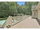 Expansive deck overlooking the backyard pool, perfect for outdoor relaxation and entertainment at 140 Silvermere, Fayetteville, GA 30215
