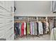 Custom walk-in closet offering extensive storage solutions with shelves and clothing racks at 140 Silvermere, Fayetteville, GA 30215