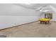 Large bonus room with angled ceilings, neutral carpet, and a pool table at 25 Ridgeview Dr, Jonesboro, GA 30236