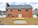 Exterior of a beautiful two-story brick home with a large backyard and patio at 362 Interlake Pass, Mcdonough, GA 30252