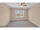 Light filled bedroom with neutral colors and a ceiling fan at 362 Interlake Pass, Mcdonough, GA 30252