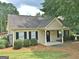 Charming single-story home with a well-maintained lawn and inviting curb appeal at 155 Westminister Village Blvd, Sharpsburg, GA 30277