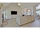 Spacious living room features vaulted ceilings, a fireplace, neutral colors, and modern finishes at 155 Westminister Village Blvd, Sharpsburg, GA 30277