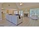 Bright and airy living room featuring a fireplace, modern furnishings, and durable vinyl flooring at 155 Westminister Village Blvd, Sharpsburg, GA 30277