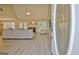 Spacious living room with a fireplace, vaulted ceiling, and lots of natural light at 155 Westminister Village Blvd, Sharpsburg, GA 30277