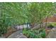 Scenic view of the community pool area, nestled amidst lush greenery and landscaping at 155 Westminister Village Blvd, Sharpsburg, GA 30277