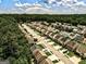 Aerial shot shows the layout of a charming neighborhood lined with trees and greenery at 134 Watercress Ct, Stockbridge, GA 30281
