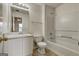 Bathroom with vanity, mirror, toilet, and shower-tub combo at 134 Watercress Ct, Stockbridge, GA 30281