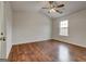 Spacious bedroom with vaulted ceiling, ceiling fan, and wood-look flooring at 134 Watercress Ct, Stockbridge, GA 30281