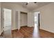 Bedroom with walk-in closet, ensuite bathroom, and wood-look flooring at 134 Watercress Ct, Stockbridge, GA 30281