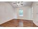 Bedroom featuring wood-look flooring and a window at 134 Watercress Ct, Stockbridge, GA 30281