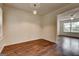Dining room with hardwood floors and open access to the living room at 134 Watercress Ct, Stockbridge, GA 30281