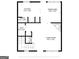 A detailed floor plan showcases the kitchen, dining area, and living room at 134 Watercress Ct, Stockbridge, GA 30281