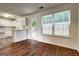 Eat-in kitchen with stainless steel appliances and ample cabinet space at 134 Watercress Ct, Stockbridge, GA 30281