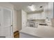 Bright kitchen featuring white cabinets and modern appliances at 134 Watercress Ct, Stockbridge, GA 30281
