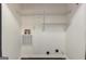 Laundry room with wire shelving and washer/dryer hookups at 134 Watercress Ct, Stockbridge, GA 30281