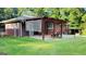 Enjoy this backyard patio, perfect for outdoor dining with a brick exterior at 1527 Patricia Dr, Morrow, GA 30260