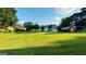 Expansive backyard with grass, and storage buildings at 1527 Patricia Dr, Morrow, GA 30260