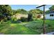 Spacious backyard featuring a garden, lush lawn, and mature trees in a serene setting at 1527 Patricia Dr, Morrow, GA 30260