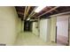 Long basement hallway with storage cabinets, providing a practical and organized space at 1527 Patricia Dr, Morrow, GA 30260