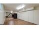 Spacious basement area with stairs and bunk beds, perfect for a playroom or additional living space at 1527 Patricia Dr, Morrow, GA 30260
