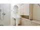 Bathroom with pedestal sink, modern shower and extra cabinet space at 1527 Patricia Dr, Morrow, GA 30260